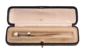 A French pearl stick pin, circa 1900, the pearl terminal with rose cut diamond base, French poincon