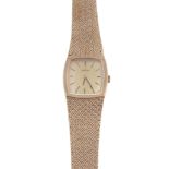 Omega, a cushion form lady's 9 carat gold bracelet watch, no.7115570, hallmarked for London 1974,