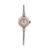 Vertex, ref. 246/2211, a lady's two colour and diamond bracelet watch, manual wind movement, 17