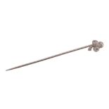 A three stone diamond stickpin, the old cut diamonds set as a clover with small stalk,