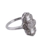 A diamond ring, the central brilliant cut diamond collet set within a surround of baguette cut and