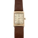 Record, ref.133497, a 9 carat gold rectangular wristwatch, hallmarked London 1954, cal.110, tonneau