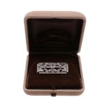 An Art Deco diamond brooch, circa 1930, the pierced rectangular panel set with old brilliant and