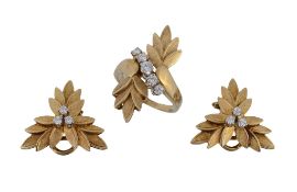 A diamond dress ring and ear clips, the foliate crossover dress ring with a diagonal row of