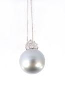 A South Sea cultured pearl and diamond pendant, the black cultured pearl with a brilliant cut