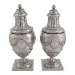 A pair of Continental silver coloured sugar casters, pseudo marks, Dutch import tax marks, early