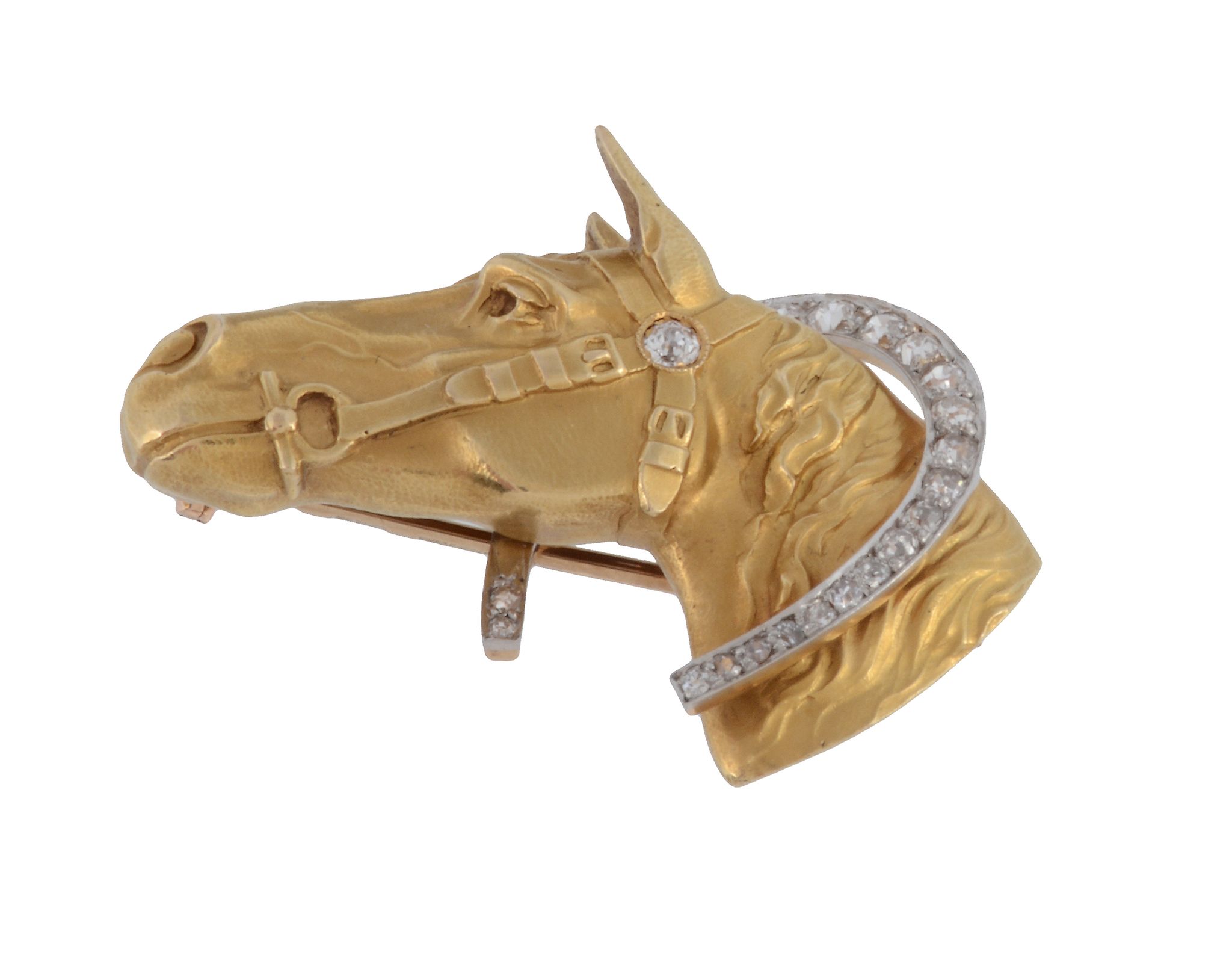 An early 20th century horse head brooch, circa 1900, the bridled horse with an old cut diamond set