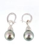 A pair of diamond and South Sea cultured pearl ear pendents, the diamond set earhoops with