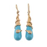 A pair of reconstituted turquoise and diamond snake ear pendants, the polished reconstituted