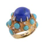 A lapis lazuli, turquoise and diamond set dress ring by Trio , the central cabochon lapis lazuli