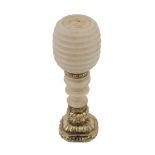 A gold mounted ivory desk seal, unmarked, mid 19th century, the horizontally ribbed turned ivory