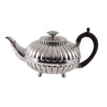 A George III silver lobed circular teapot by Henry Nutting & Robert Hennell II, London 1809. with