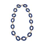 A lapis lazuli necklace , the woven small lapis bead links with circular link connectors, 47cm long