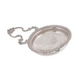 An early George III silver orange or lemon strainer, maker's mark pierced through (W ), London