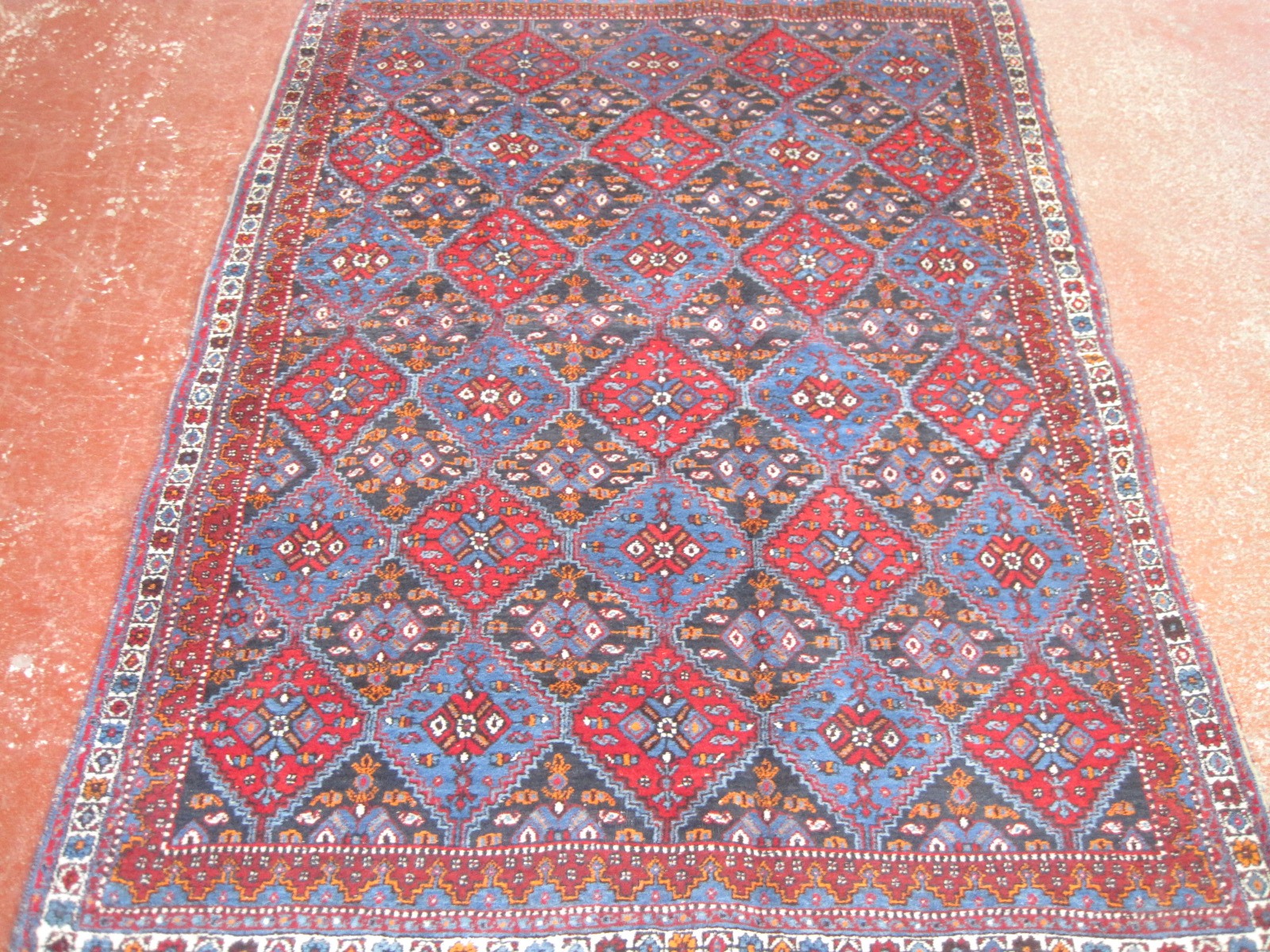 A Persian Afshar rug 220 x 157cm £120-180