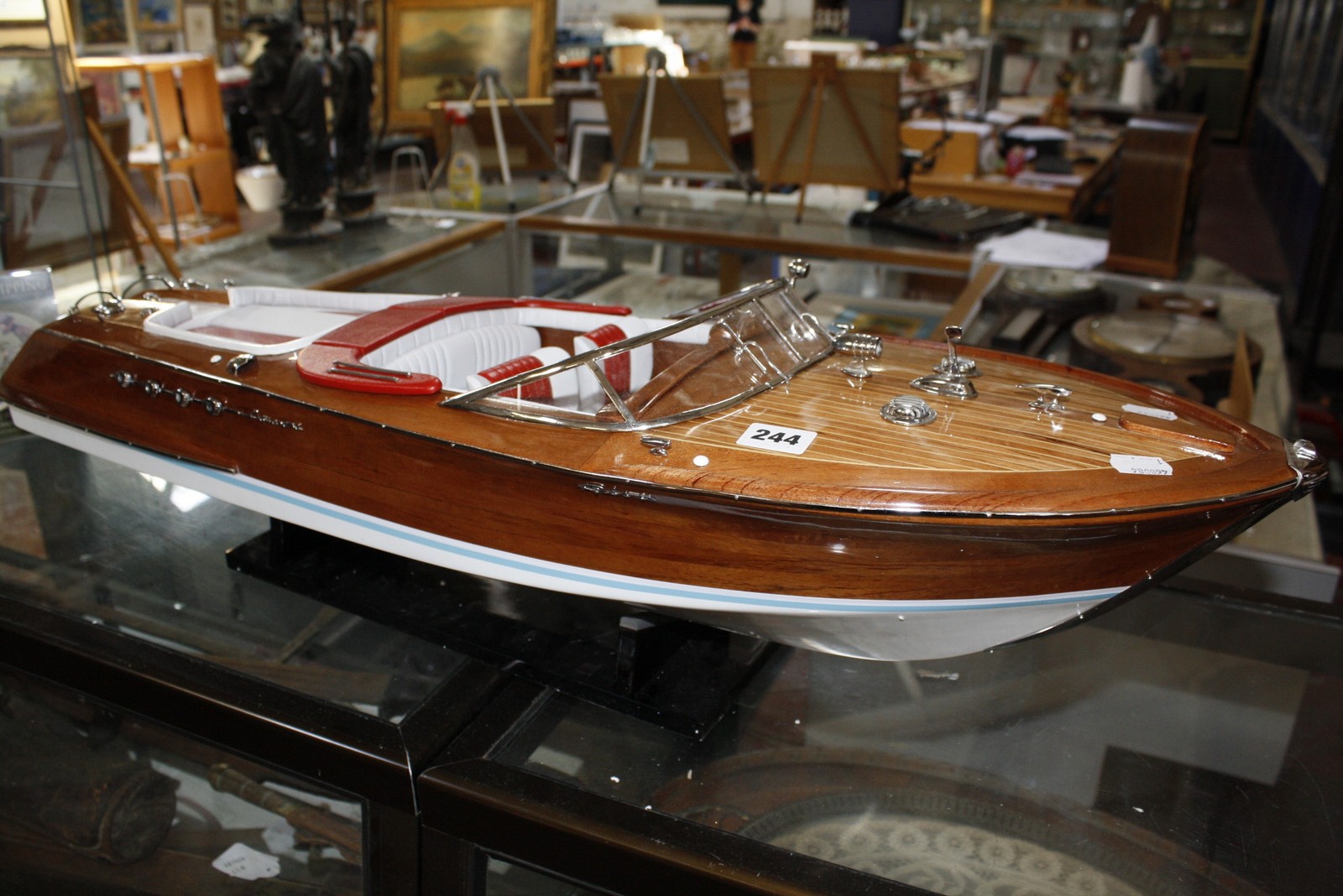 A scale model of an Italian Riva Aquarama speed boat on stand, 91cm. £200-300