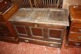 An 18th Century oak mule chest with panelled lid and front and frieze drawer 97cm wide £150-200