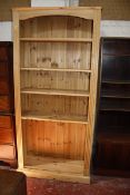 A modern pine bookcase with adjustable shelves 199cm high, 96cm wide £45-60