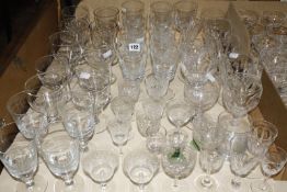A collection of drinking glasses, some with engraved decoration and some cut glass. £80-120