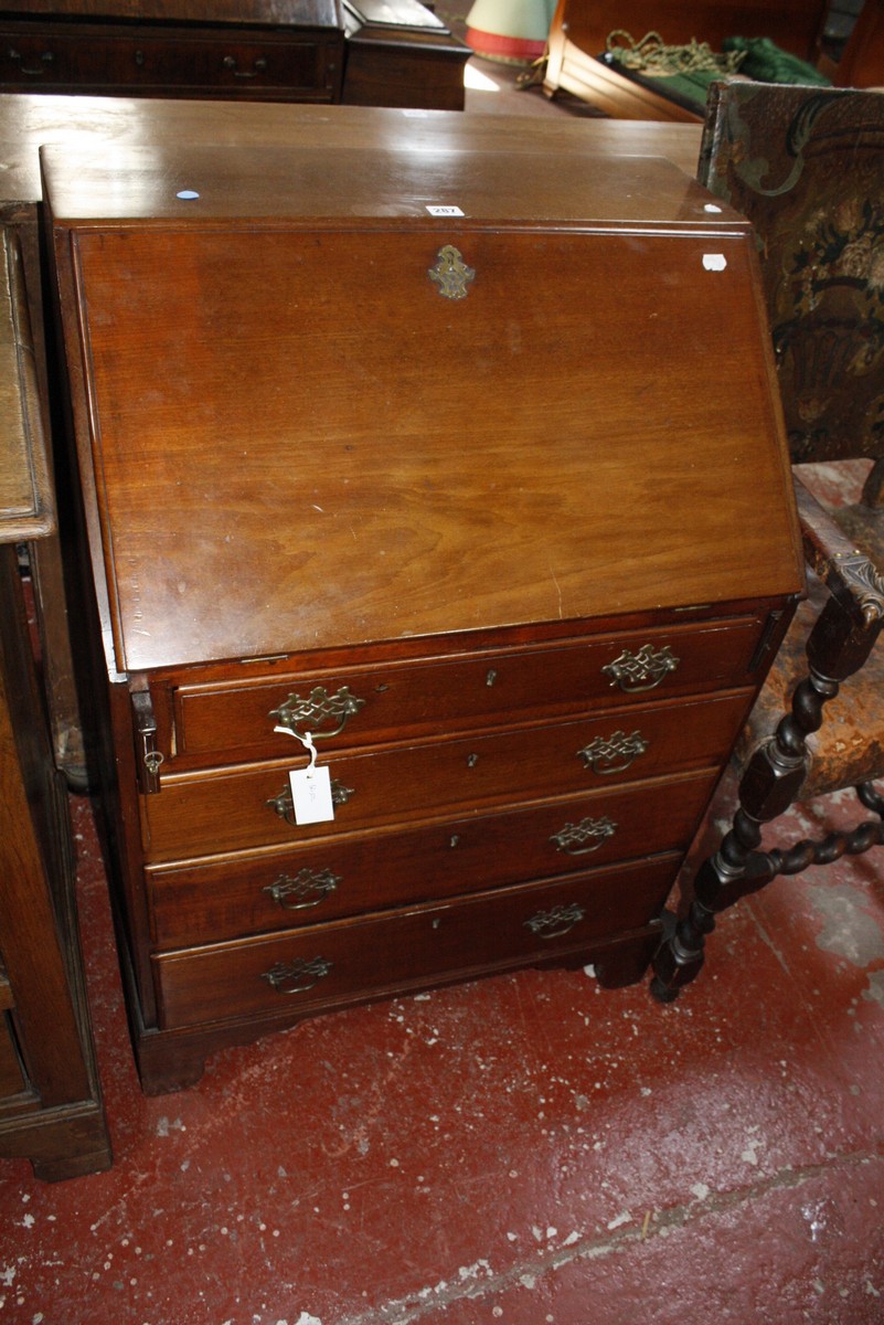 An Edwardian mahogany and inlaid bureau £80-120