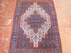 A Persian Senneh rug £100-150