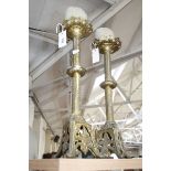 A pair of gilt ecclesiastical candlesticks with Maltese Cross decoration.50cm high. £80-120