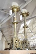 A pair of gilt ecclesiastical candlesticks with Maltese Cross decoration.50cm high. £80-120