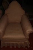 An upholstered armchair, circa 1920 £80-120