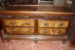 An Arts & Crafts mahogany sideboard with walnut faced drawers.181cm wide x 94cm high x 54cm deep. £