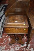 An early Victorian rosewood work table 77cm high, 42cm wide £70-100