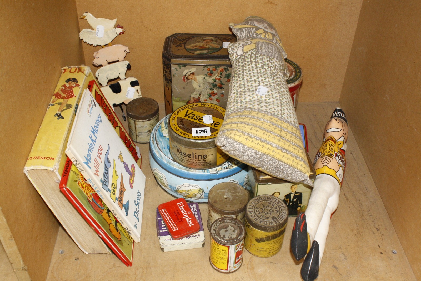 A small collection of tins three children's books, a Sunny Jim soft toy etc. £40-60