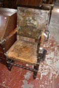 An oak armchair with weathered leather seat, barley twist legs and stretchers  Best Bid
