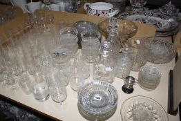 A quantity of decorative glassware, to include lemonade glasses, plates, decanters and bowls. £60-