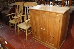A Victorian style pine cabinet 109cm high, 96cm wide and a pair of Victorian style pine kitchen