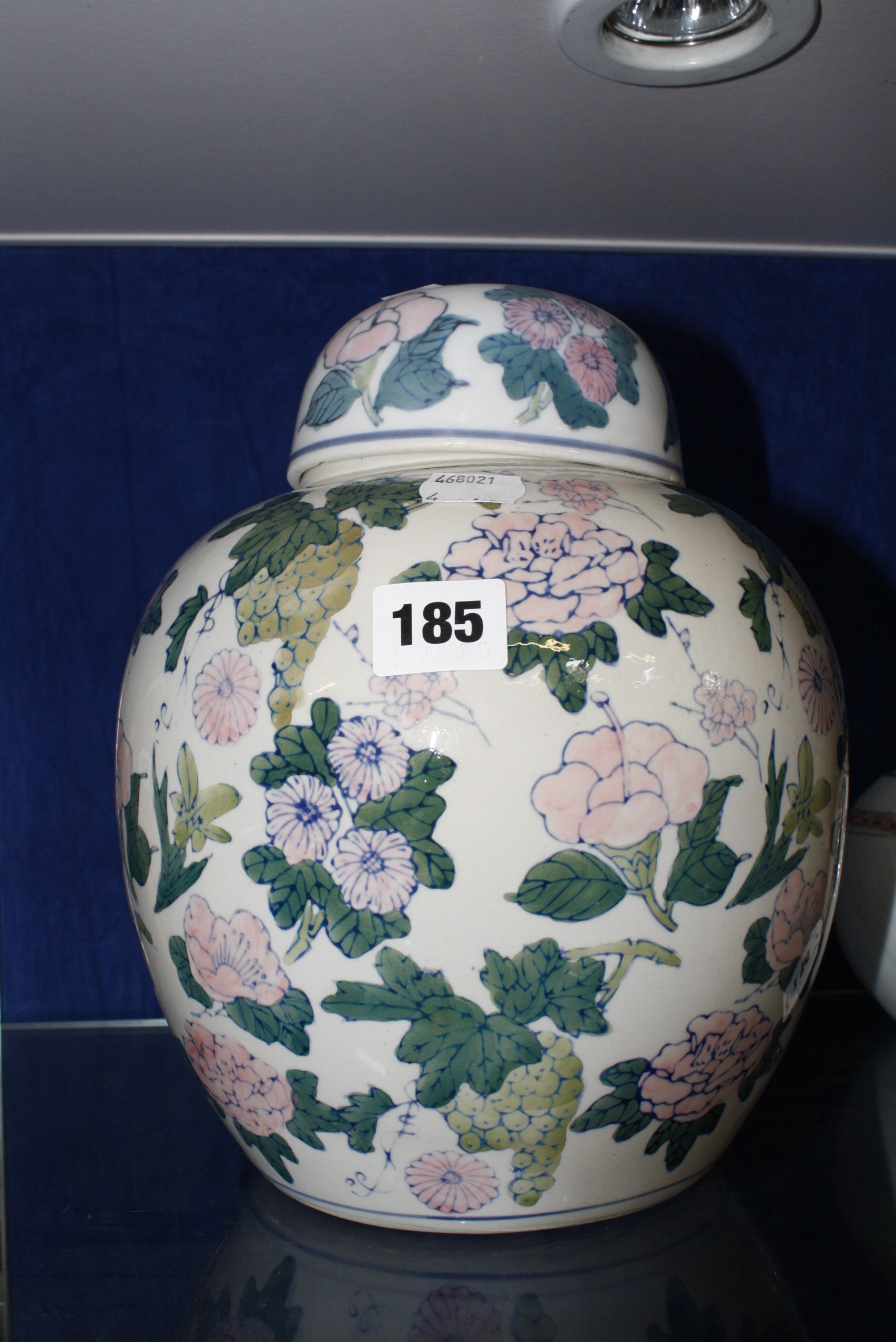 A 20th Century Chinese ginger jar, wih cover, floral decorated, 25cm high £60-80