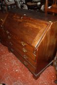 A George III mahogany bureau with four long drawers 110cm wide £150-250