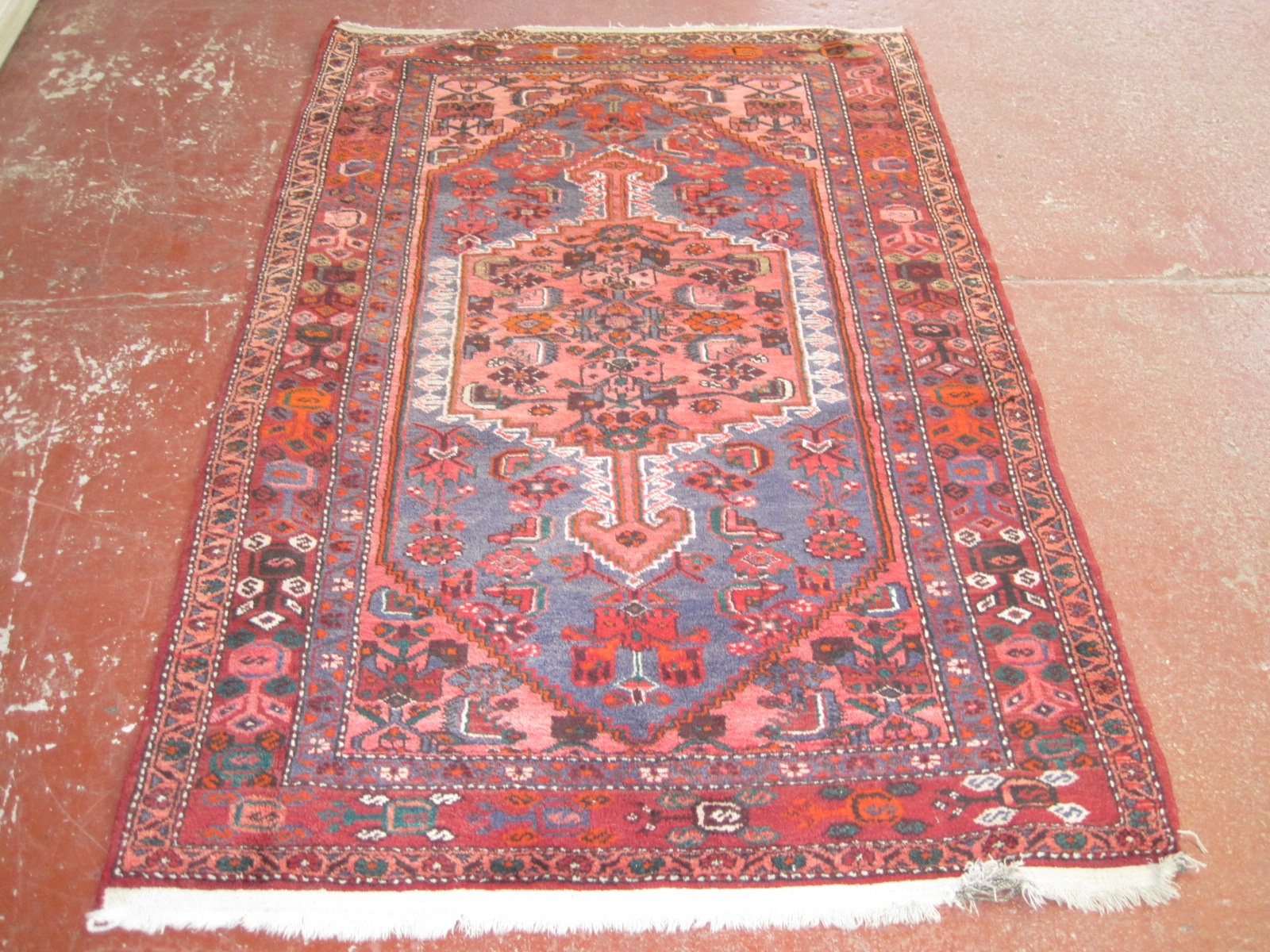 A Persian Nahavand rug 210 x 138cm £80-120