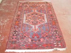 A Persian Nahavand rug 210 x 138cm £80-120