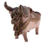 A Peruvian pottery model of a horned oxen £80-120