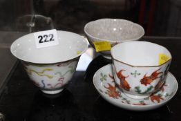 A Chinese famille rose porcelain cup, a 19th c Chinese teabowl and saucer painted with goldfish