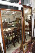 A mahogany framed rectangular wall mirror, and five other small wall mirrors £50-80