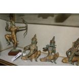 A group of six verdi gris gold finished bronze Thai musicians 14cm high and a Thai dancer. £350-400