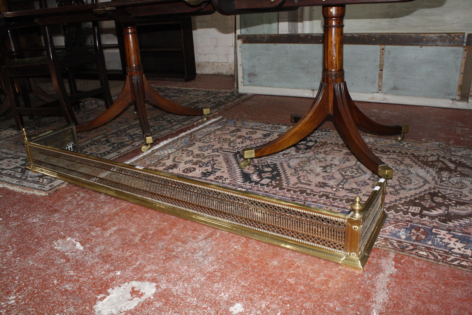 A 19th Century pierced brass fender. 156cm internal width. £60-80