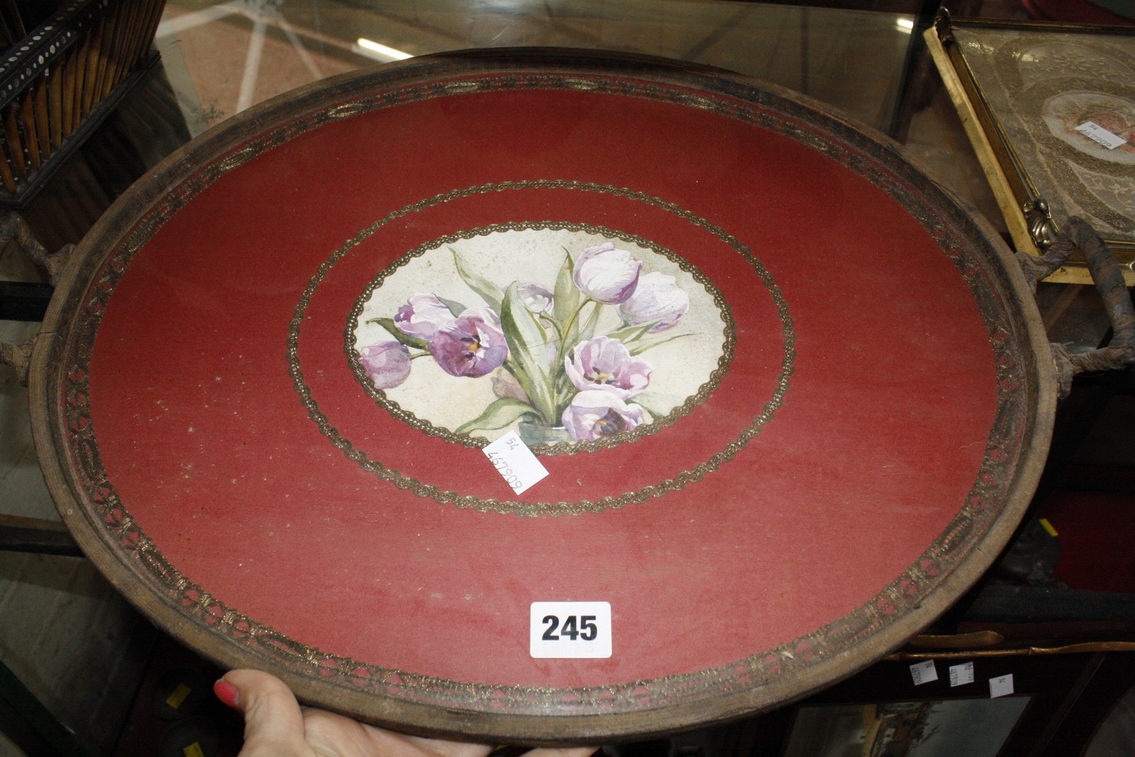 A sample wood oval tray, 4 other trays and a quill formed basket  Best Bid