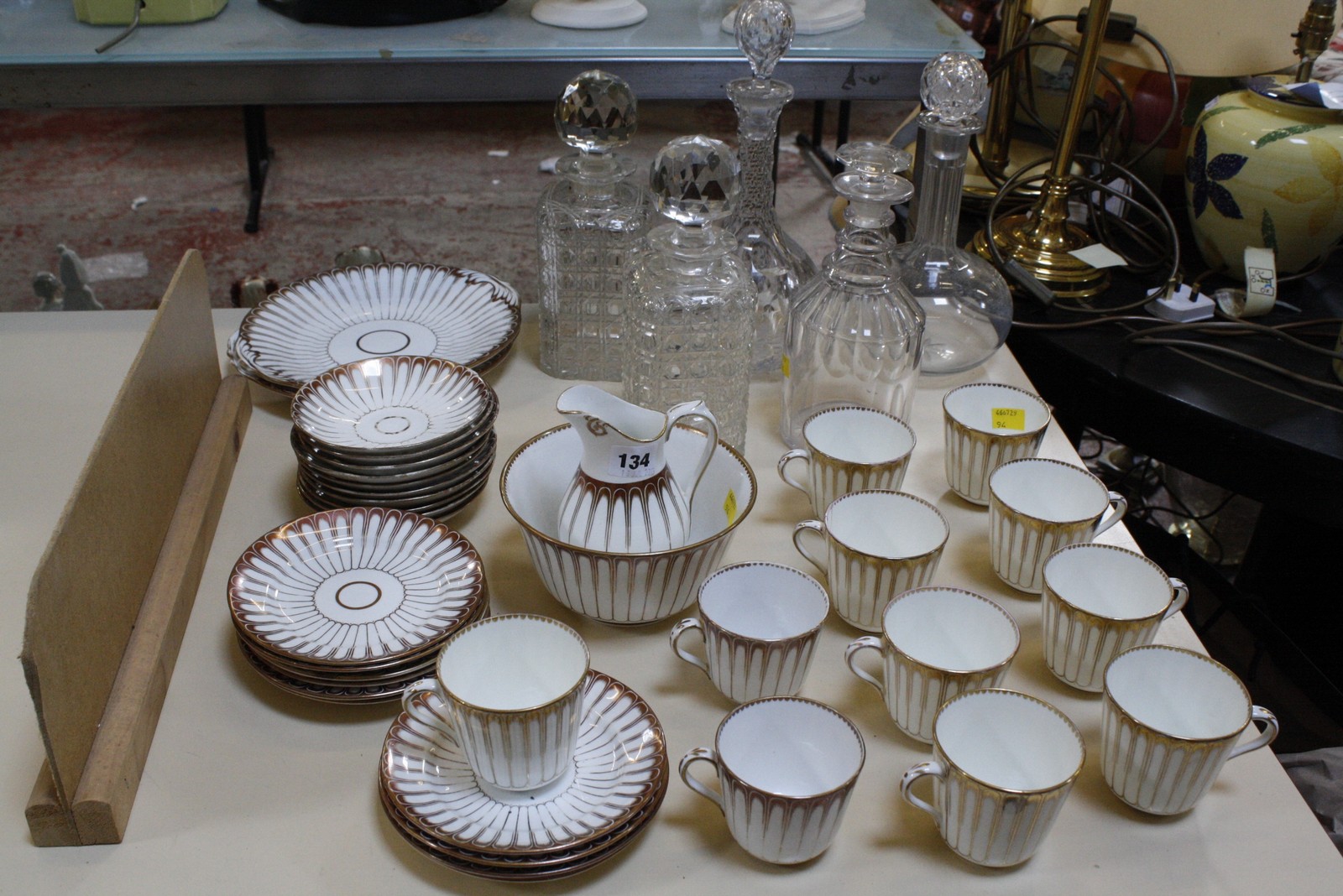 A Victorian Staffordshire part tea service, various decanters including a 19th century triple ring