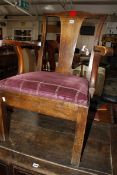 A 19th century walnut open armchair. £60-80