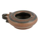 A Corinthian pottery kothon (exaleiptron), the shallow bowl with sloping shoulder and incurving rim,