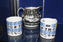 A Gray's pottery jug with peacocks, two Wedgwood Ravilious designed alphabet mugs £30-50