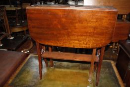 An Edwardian mahogany Sutherland table £50-80
