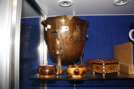 An Art Nouveau copper log bucket with stylised floral motifs, and a four treen boxes. £60-80